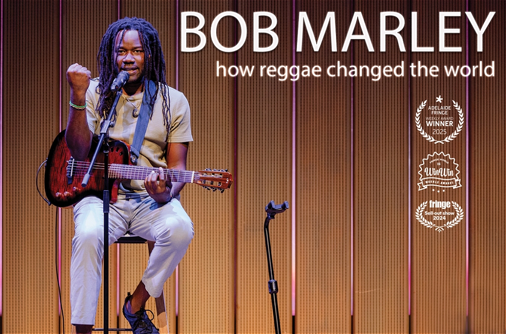 A black musician with long dreadlocks sits on a stool, playing guitar and singing into a microphone. The text above reads, 'BOB MARLEY - how reggae changed the world', with award badges displayed on the right.